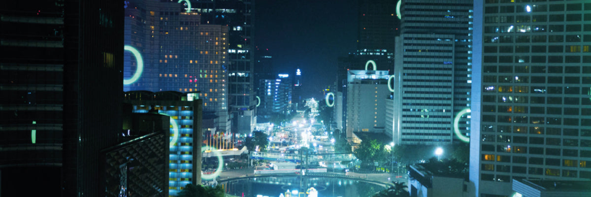 City buildings and streets illuminated at night